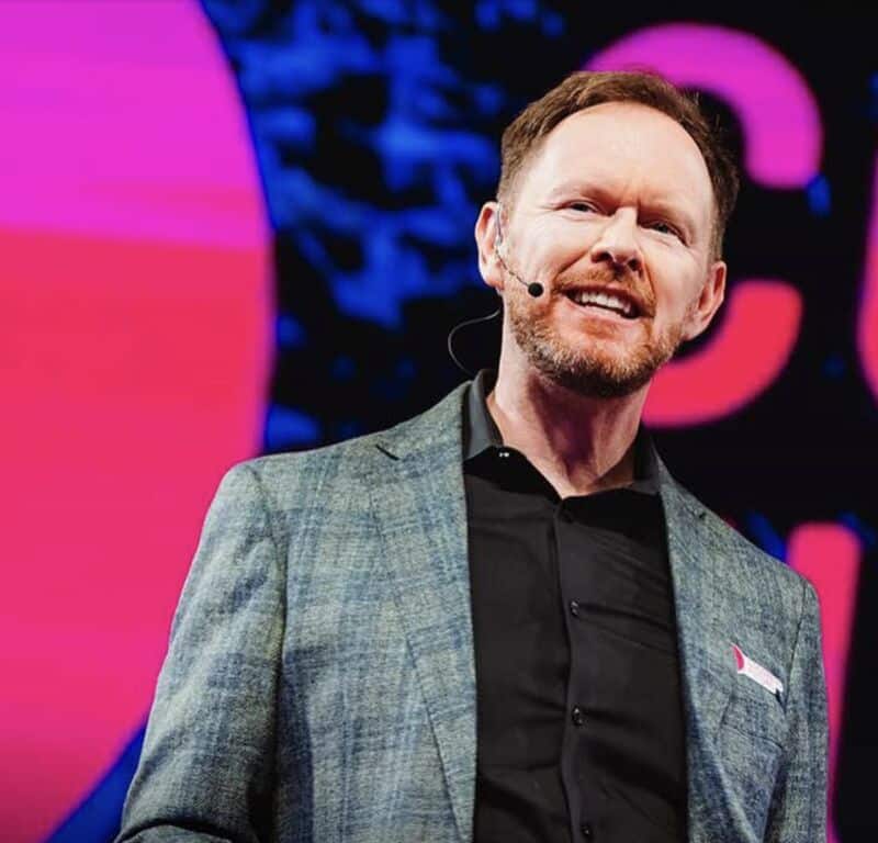 Mike Bechtel speaking on stage